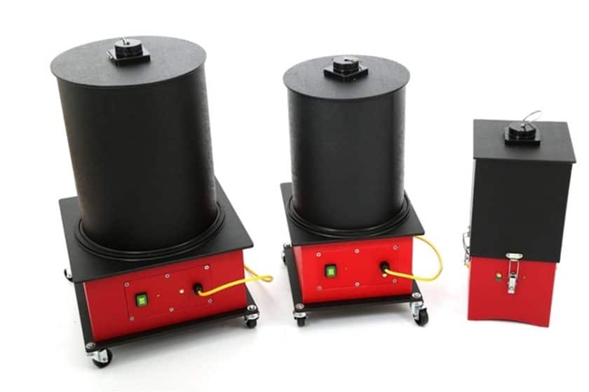 3 of Beacon's SafeChange Vacuum Cleaners in red and black